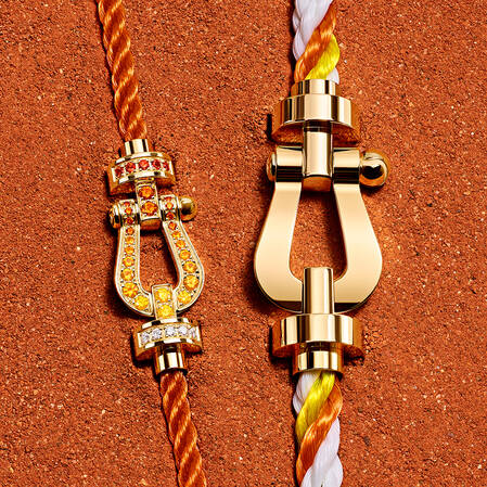 Bracelets FRED x Roland-Garros confectionnés en or, pierres et cordons tressés.